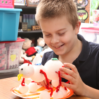 Small boy playing with toy